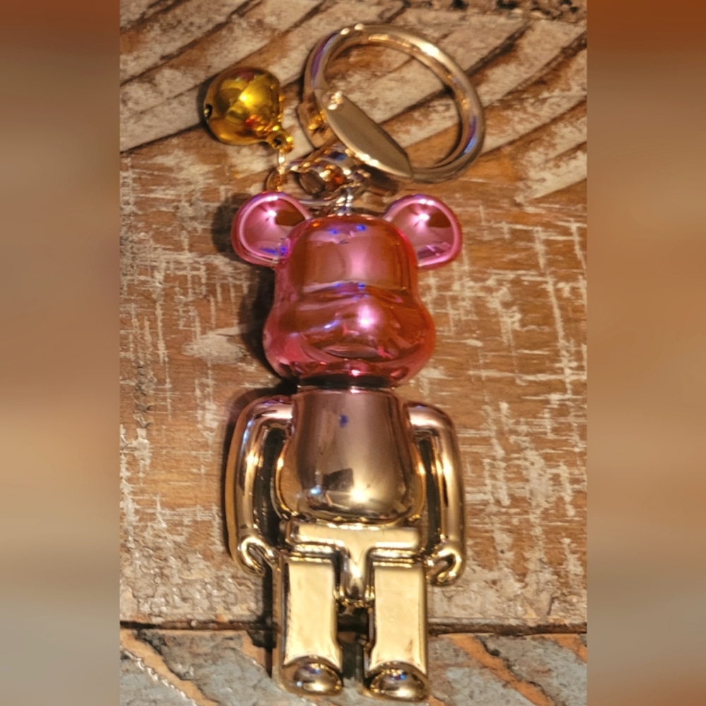 New Bearbrick keychain W Bell. Pinkish Purple and Gold.